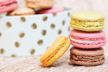 Colorful macaroons on light background