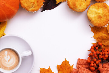 Cozy autumn flat lay with coffee, pumkin, sweater and copy space