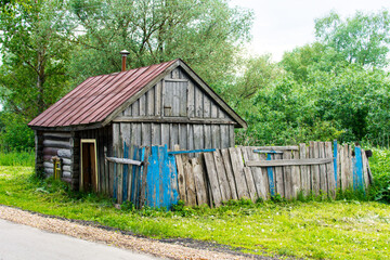 Diveevo, Russia. June 12, 2021. An old wooden house. A lonely log house. Bath.