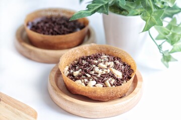 Martabak Mini or Martabak Mini Bangka with various Topping. The martabak mini bangka is made from a mixture of flour, eggs, sugar, baking soda, coconut milk and water.
