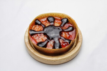 Martabak Mini or Martabak Mini Bangka with various Topping. The martabak mini bangka is made from a mixture of flour, eggs, sugar, baking soda, coconut milk and water.