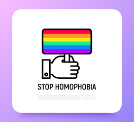 Stop homophobia thin line icon, rainbow flag in hand. Modern vector illustration.