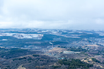 Fototapeta na wymiar Kislovodsk, Russia. December 28, 2018. View from a high mountain to the mountains and forest of Kislovodsk.