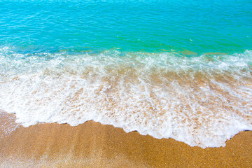 Russia, Crimea, Feodosia, Primorsky village, August 20, 2020. Bright blue waves of the Black Sea.