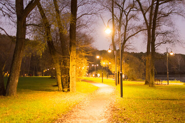 Russia, the village of Arkhangelskoe. October 7, 2020. Beautiful autumn natural park with a river, trees at sunset.