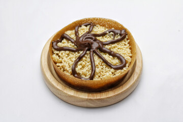 Martabak Mini or Martabak Mini Bangka with various Topping. The martabak mini bangka is made from a mixture of flour, eggs, sugar, baking soda, coconut milk and water.