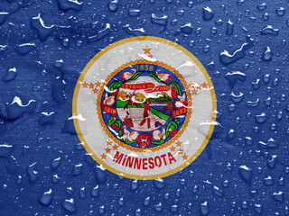 flag of Minnesota, USA with rain drops