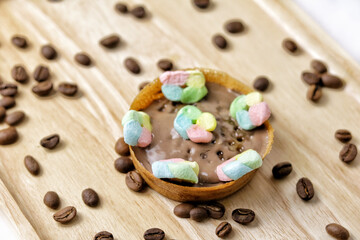 Martabak Mini or Martabak Mini Bangka with various Topping. The martabak mini bangka is made from a mixture of flour, eggs, sugar, baking soda, coconut milk and water.