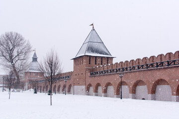 Russia, Tula. January 9, 2021. Red brick walls and towers of the Tula Kremlin in winter.