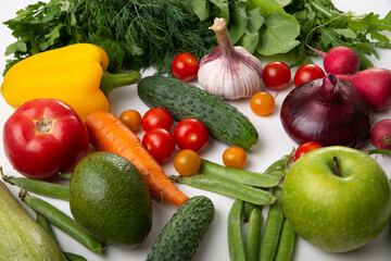 Set of red and green vegetables and fruits on a white background. Low carbohydrate, low calorie diet. Healthy eating, nutrition and diet background concept
