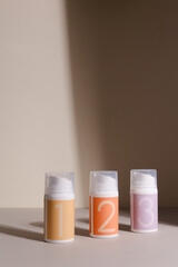 Skincare routine 1 2 3 step for healthy skin - serum, lotion or eye cream packaging. Beauty and cosmetic concept. Copy space.