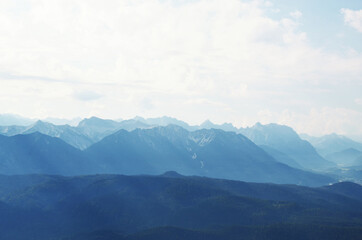 Obraz premium GERMANY, MUNCHEN: Scenic landscape aerial view of Bavarian Alp mountains with lake in the valley 