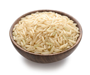 uncooked brown rice in the wooden bowl, isolated on the white background