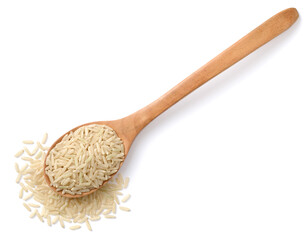 raw long brown rice in the wooden spoon, isolated on the white background, top view