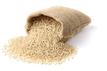 uncooked long brown rice in the sack, isolated on the white background