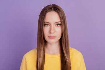 Fototapeta premium Portrait of charming pretty calm focused lady look camera on violet background