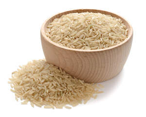 uncooked long brown rice in the wooden bowl, isolated on the white background