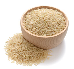 uncooked long brown rice in the wooden bowl, isolated on the white background