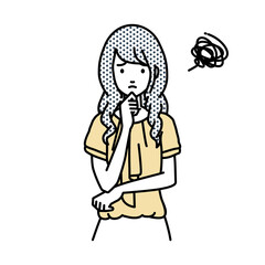 立って手をあごにあてて困っているオフィスカジュアルの女性