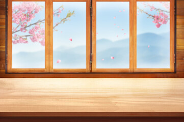 Blank Wooden table top with wood window and mountain view and sakura flower branch display for product concept