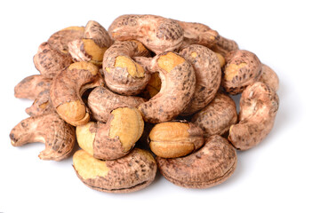 roasted cashew nuts with peel isolated on the white background