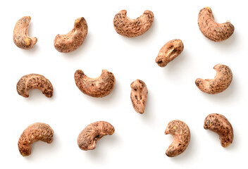 roasted cashew nuts with peel isolated on the white background, top view