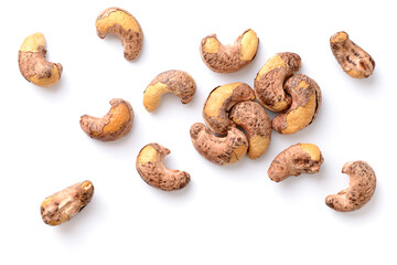 roasted cashew nuts with peel isolated on the white background, top view