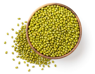 raw mung beans in the wooden bowl, isolated on the white background, top view