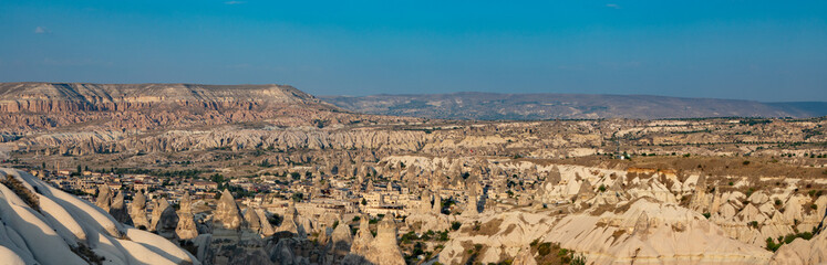 Cappadocia, Turkey - September 1, 2021 – Impressive nature by chimney rock formations and rock pillars of “love Valley” near Goreme, Cappadocia, Nevsehir, Turkey
