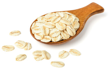 uncooked oatmeal in the wooden spoon, isolated on white