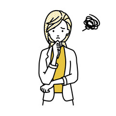 立って手をあごにあてて困っているジャケットの女性