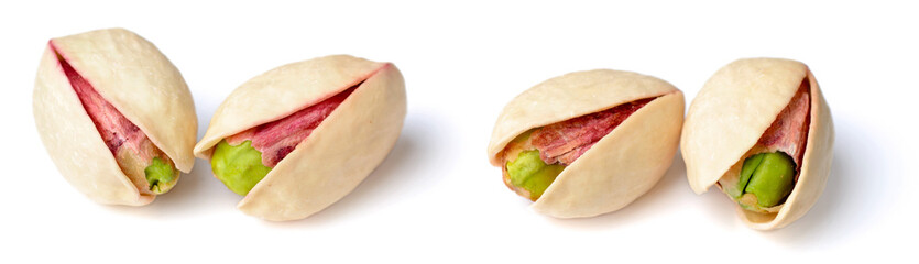 unpeeled pistachios isolated on the white background