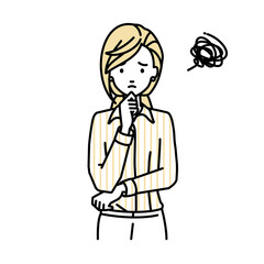 立って手をあごにあてて困っているブラウスの女性