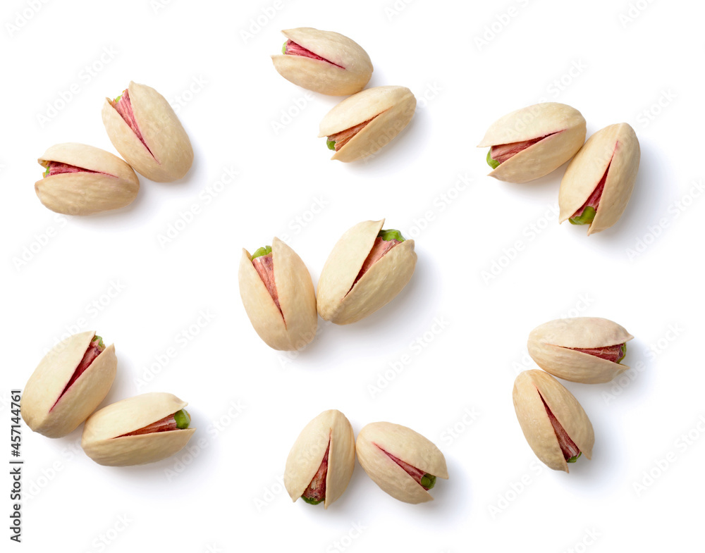 Wall mural pistachios with shell isolated on white background, top view - Wall murals