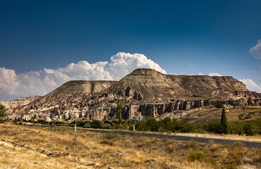 Cappadocia, Turkey - September 1, 2021 – Impressive nature by chimney rock formations and rock pillars of “love Valley” near Goreme, Cappadocia, Nevsehir, Turkey