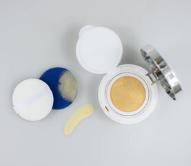 Foundation Powder Cushion , Makeup Cosmetics, Brown Cream, Case makeup and puff on White background.