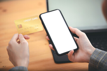 girl holding a credit card and using a laptop Business woman working from home . online shopping, ecommerce, internet banking, spend money, work from home concept.