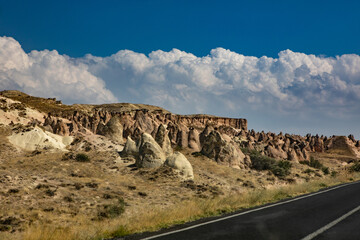 Cappadocia, Turkey - September 1, 2021 – Impressive nature by chimney rock formations and rock pillars of “love Valley” near Goreme, Cappadocia, Nevsehir, Turkey