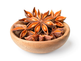 star anise in the wooden plate, isolated on the white background
