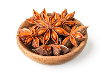 star anise in the wooden plate, isolated on the white background