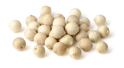 close up of dried white peppercorns isolated on the white background