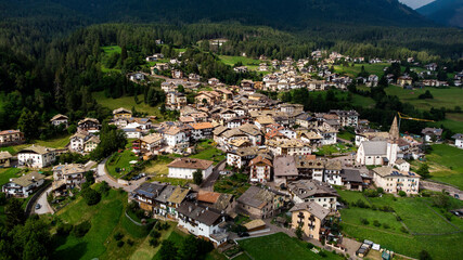 Naklejka premium Dolomites: aerial view of the town of Daiano