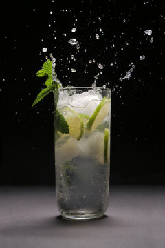 Mojito splash studio on black background
