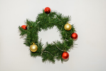 Green little christmas wreath. christmas wreath isolated on white