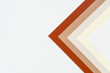 abstract background concept with pattern of earth tones colour paper, layers of blank brown paper and white, cream colour, beige colour background.