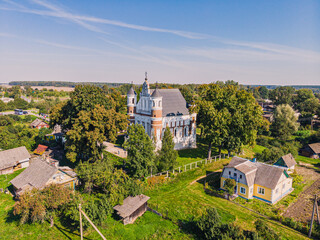 Top view of the old Church of the Nativity of the Blessed Virgin Mary in the village of Murovanka in Belarus. Drone aerial photo