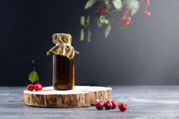 a bottle of useful homemade tincture of hawthorn berries. alternative home therapy