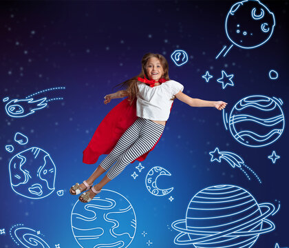 Conceptual artwork with little girl flying in her dreams among drawn planets in outer space. Ideas, inspiration, imagination. Collage