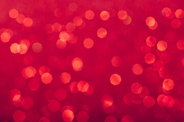 Red glowing sequins blurred background