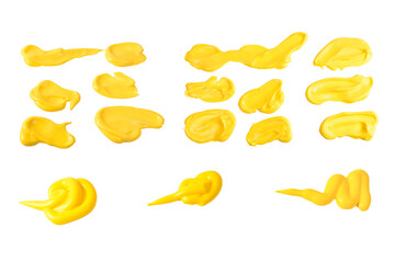 Yellow sauce splashes isolated on white background.
